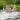 The Girl Swims Against The Background Of Bathing Other Family Members.